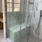 Walk-in shower with built-in bench